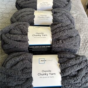 Gray Chenille Chunky Yarn, you get a bundle of four.